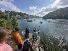 At the ferry with other coast walkers - an engine issue meant we had over half an hour to wait